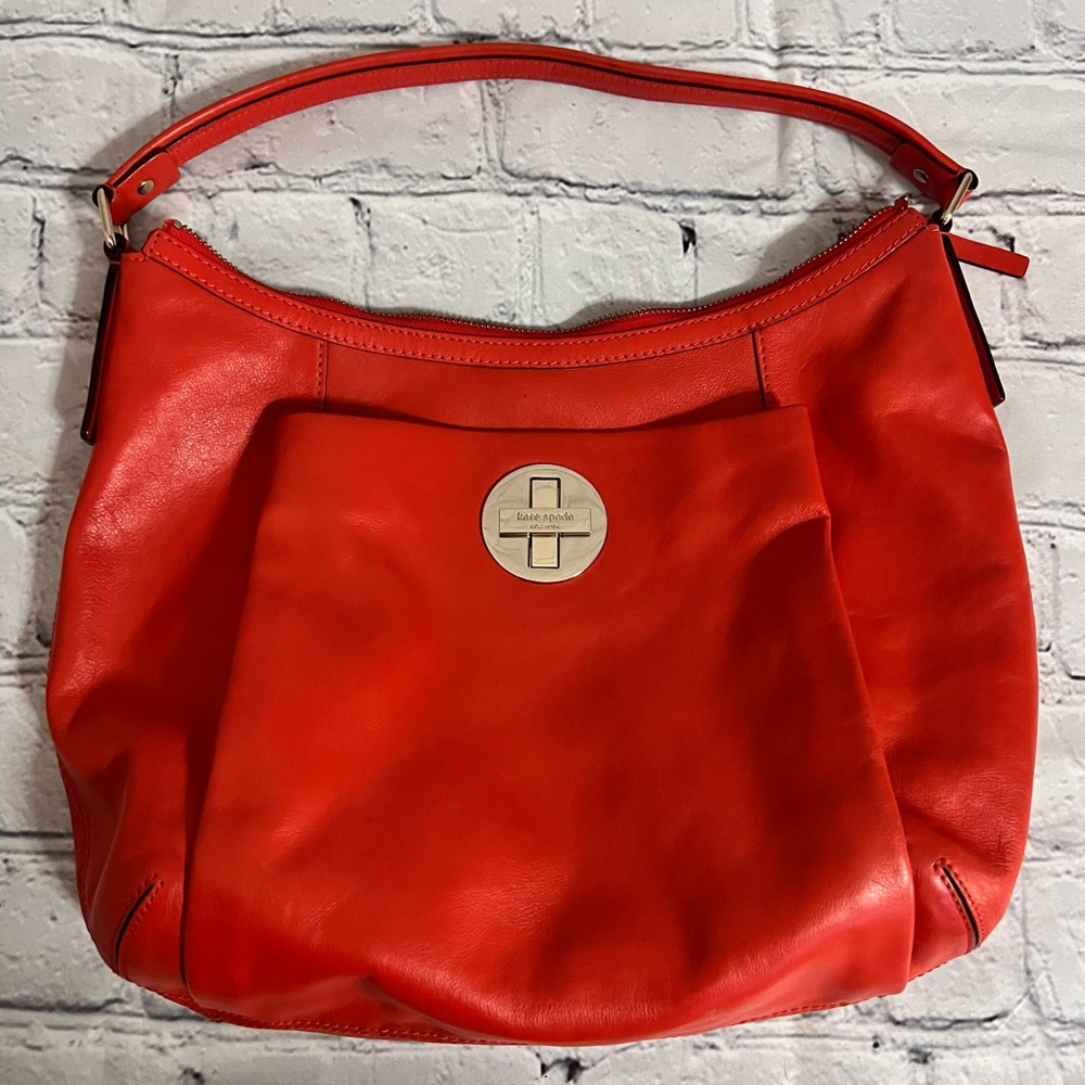 Kate Spade Large Hobo Handbag, Orange Leather With Black Polka Dots Inside.